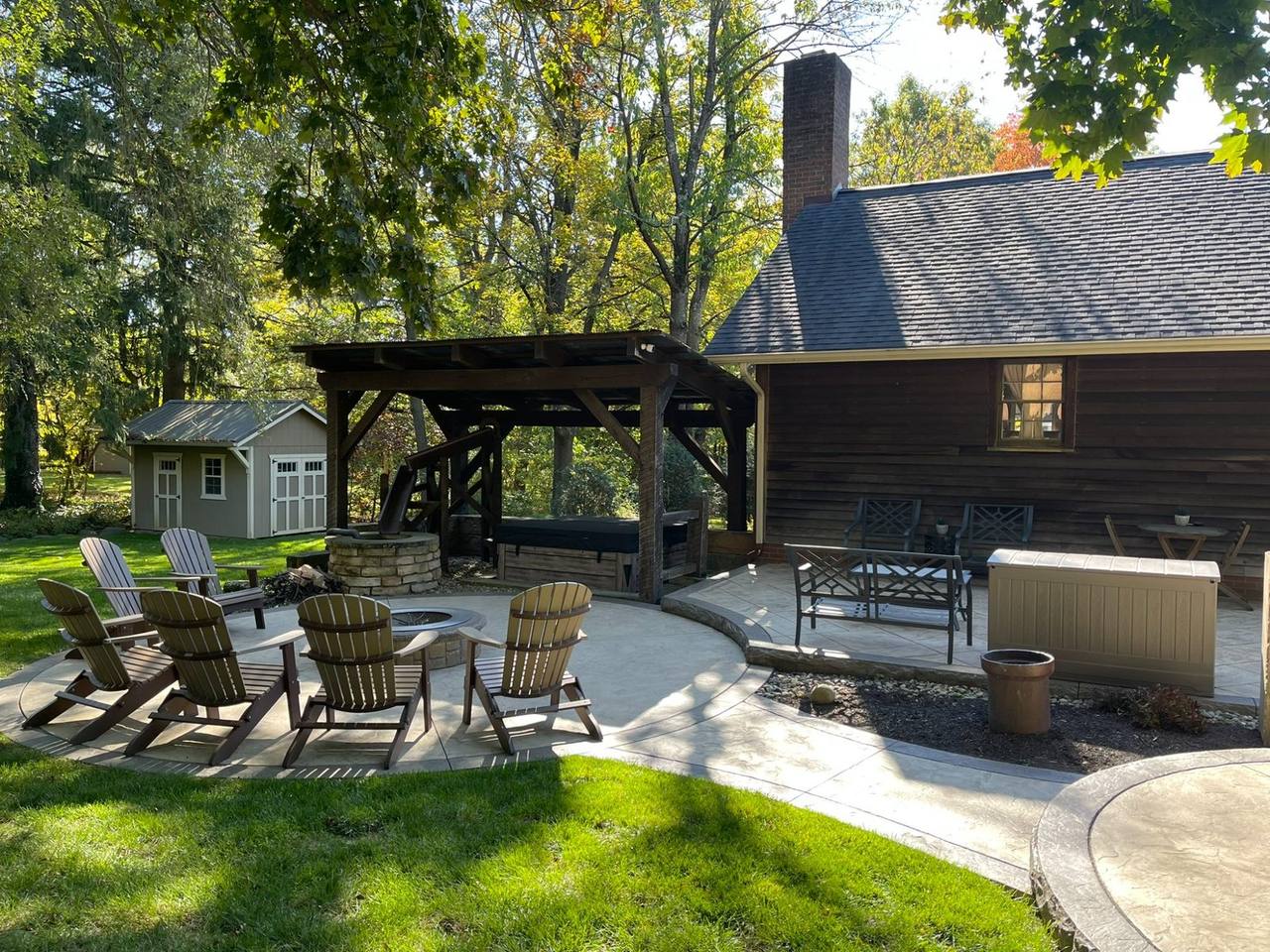 Cozy Carriage House exterior with patio and fire pit